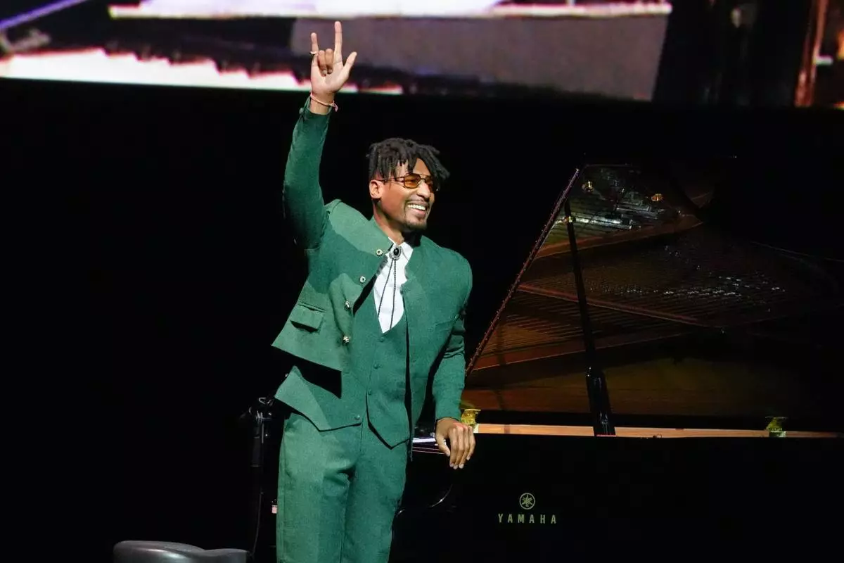 Jon Batiste performs during the Amazon MGM Studios presentation at CinemaCon on Wednesday, April 15, 2026, at Caesars Palace in Las Vegas. (AP Photo/Chris Pizzello)