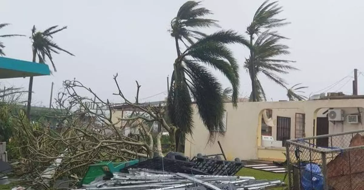 Typhoon flipped over cars and ripped away roofs on US islands in the Pacific Ocean