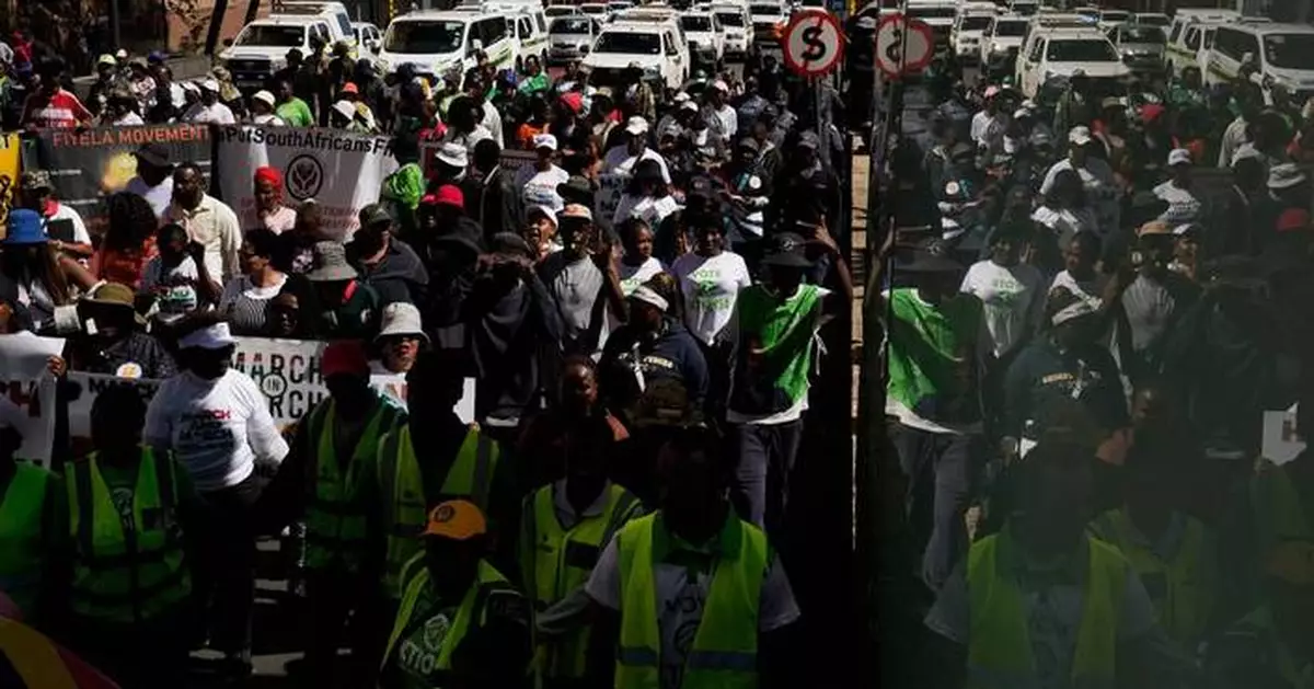 Hundreds march in Johannesburg against illegal migration as shops shut over looting fears