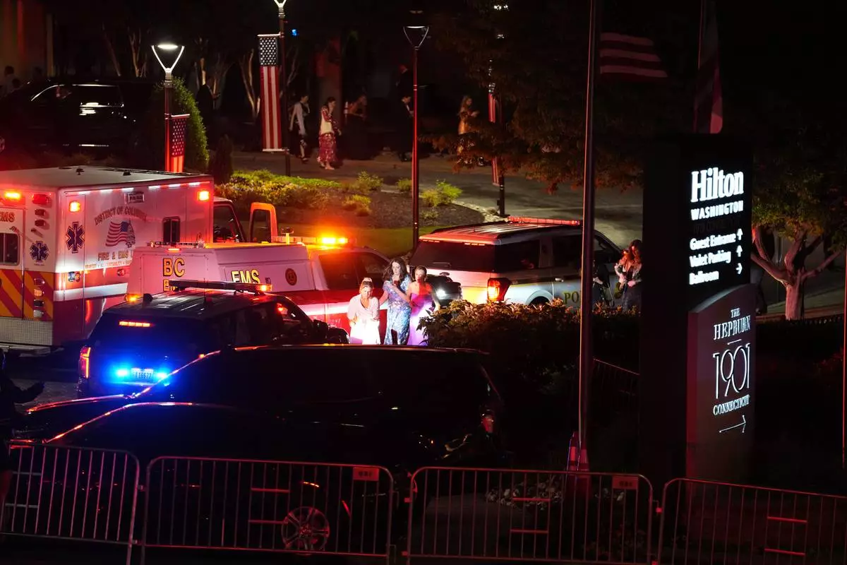 Law enforcement respond to an incident at the Washington Hilton during the White House Correspondents Dinner, Saturday, April 25, 2026, in Washington. (AP Photo/Allison Robbert)