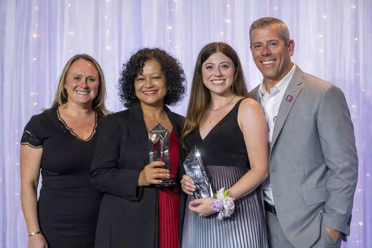 Maxim Healthcare Leaders Jarrod DePriest and Kellie Lanier present Sothavy Pfaff, an LVN from San Diego, and Mackenzie Leischner, a Lead Registered Behavior Technician from Orlando, with the National Caregiver of the Year awards. Pfaff and Leischner were honored during a national awards ceremony in Dallas on April 15th.