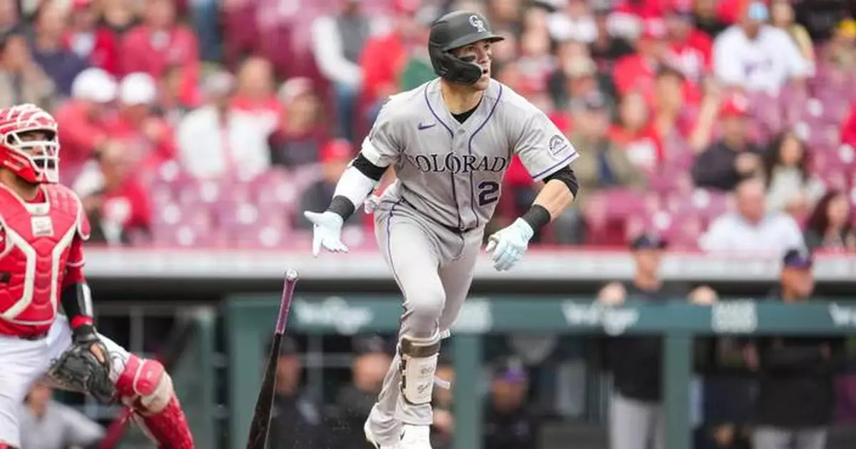 Goodman hits 2 HRs, Sugano pitches 5 1/3 scoreless innings, Rockies beat Reds 13-2