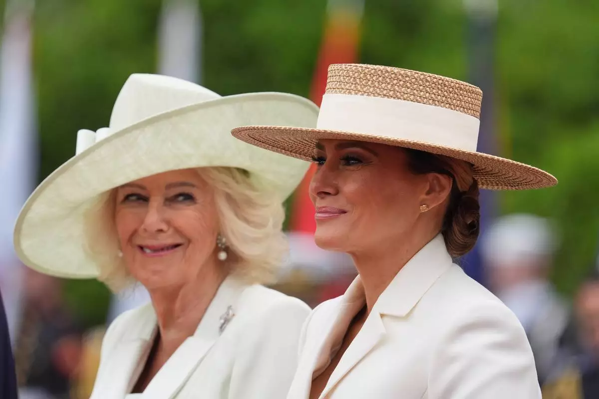 First lady Melania Trump and Queen Camilla, during a State Visit arrival ceremony on the South Lawn of the White House, Tuesday, April 28, 2026, in Washington. (AP Photo/Mark Schiefelbein)