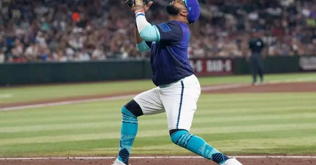 Diamondbacks put Carlos Santana on injured list with adductor strain, select Luken Baker