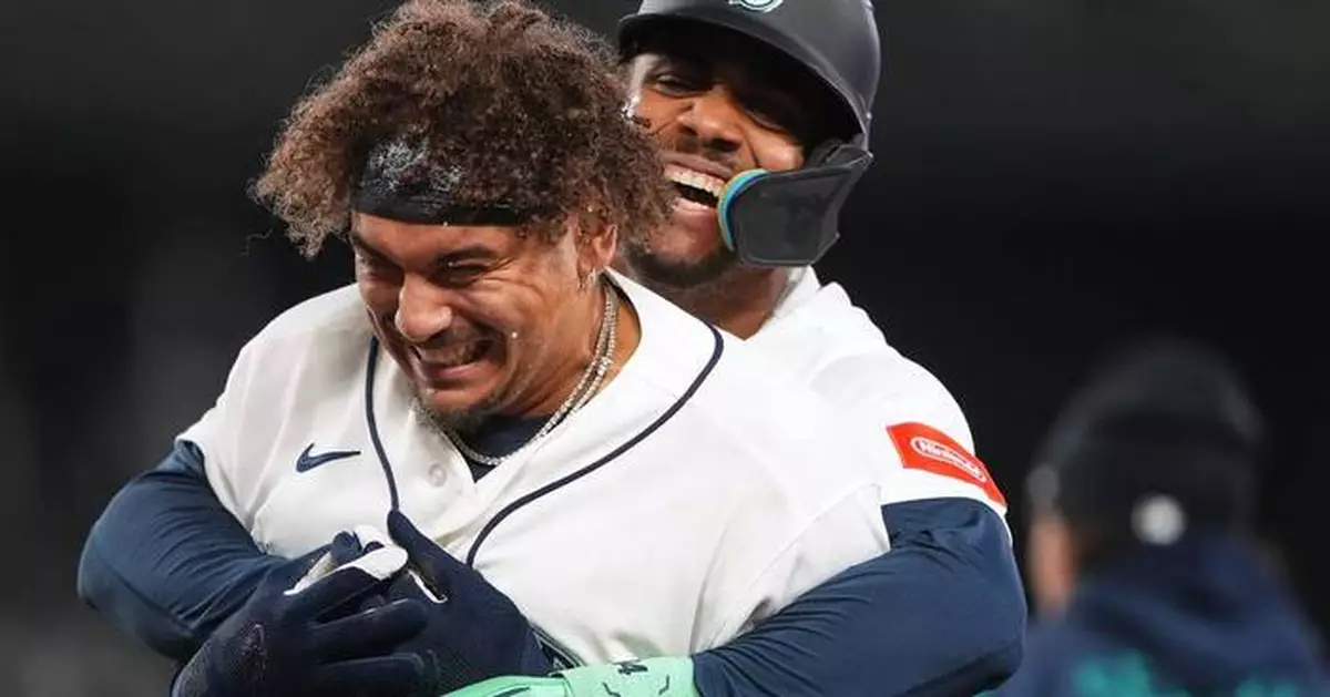 Josh Naylor hits walk-off single and Cal Raleigh homers as Mariners beat A's 5-4 to avoid sweep
