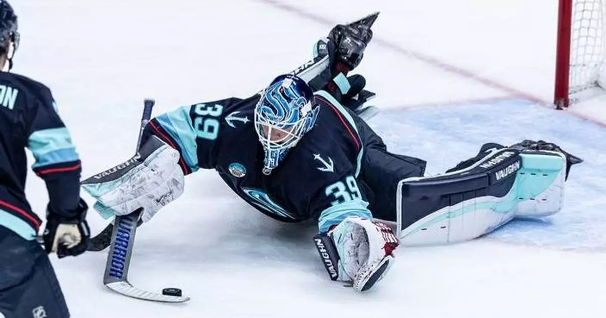 Kokko attempts goalie goal in 1st NHL start, stops 26 shots as Kraken beat Flames 4-1