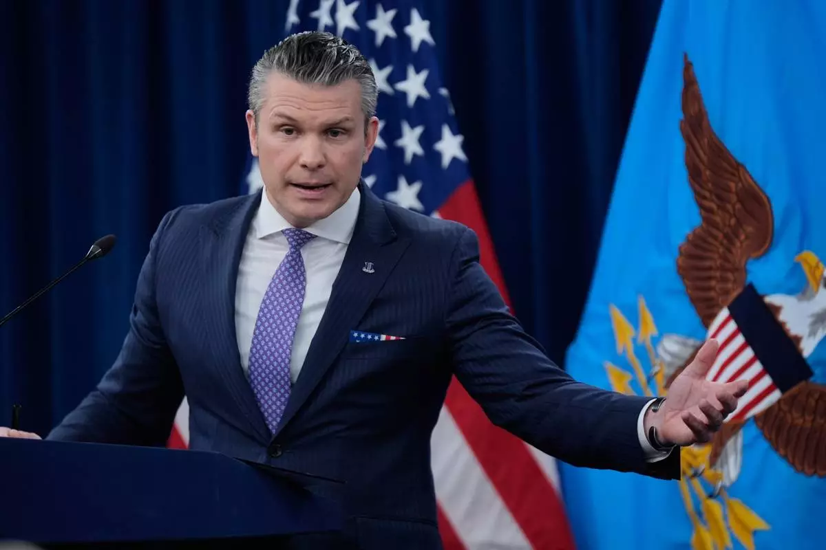 Defense Secretary Pete Hegseth speaks to members of the media during a press briefing at the Pentagon in Washington, Tuesday, March 31, 2026. (AP Photo/Manuel Balce Ceneta)
