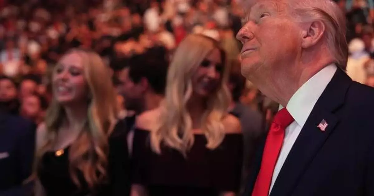 Trump takes the spotlight at UFC 327 in Miami, greeting Rogan and Rubio