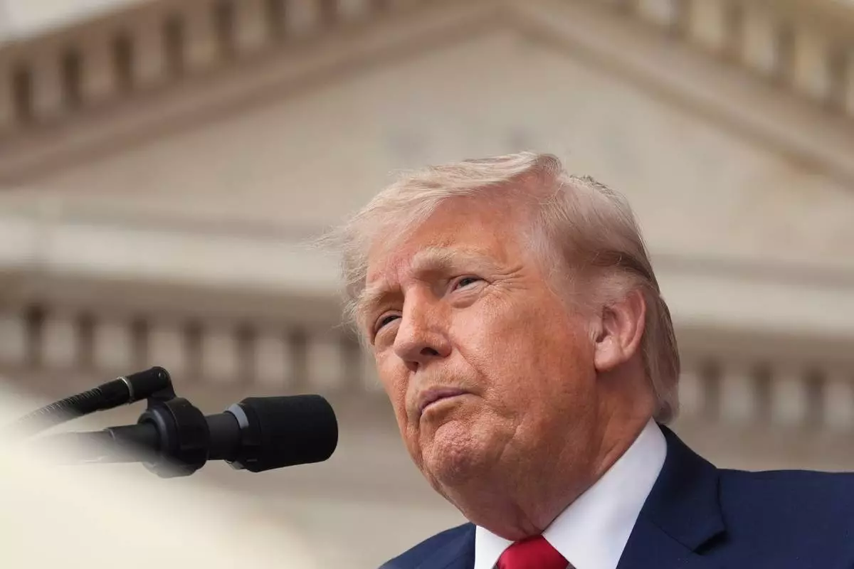 President Donald Trump speaks during the 158th National Memorial Day Observance coinciding with the nation's 250th anniversary, at the Memorial Amphitheater in Arlington National Cemetery, Monday, May 25, 2026, in Arlington, Va. (AP Photo/Alex Brandon)