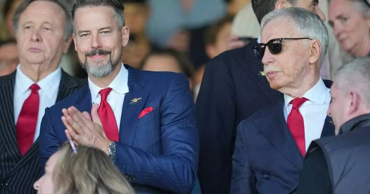 Kroenkes enjoy 'magical' title win as Arsenal's players finally get hands on Premier League trophy