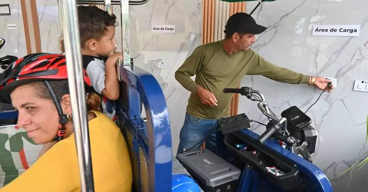 A solar-powered charging station in central Cuba brings life to a darkened island
