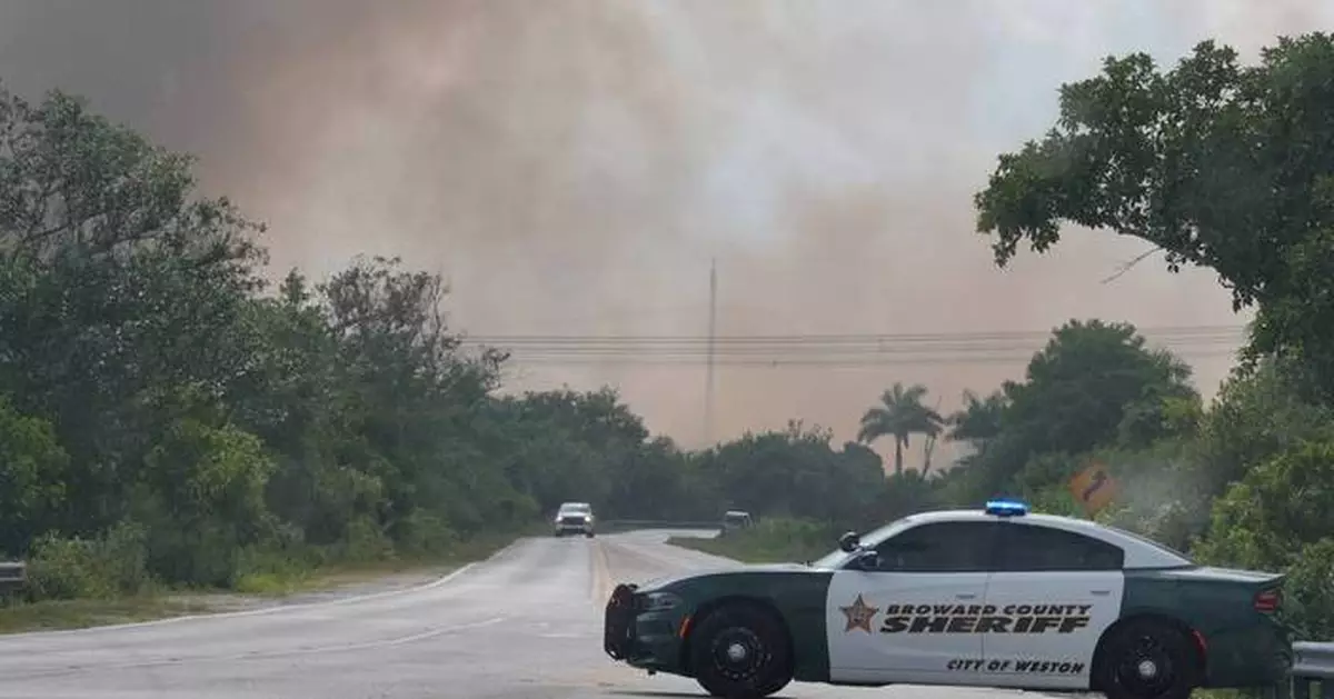 Crews battle South Florida wildfires that have burned thousands of acres