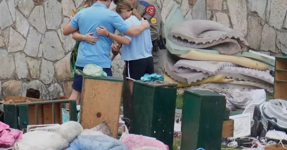 Camp Mystic drops summer reopening plan over outrage by families and Texas lawmakers