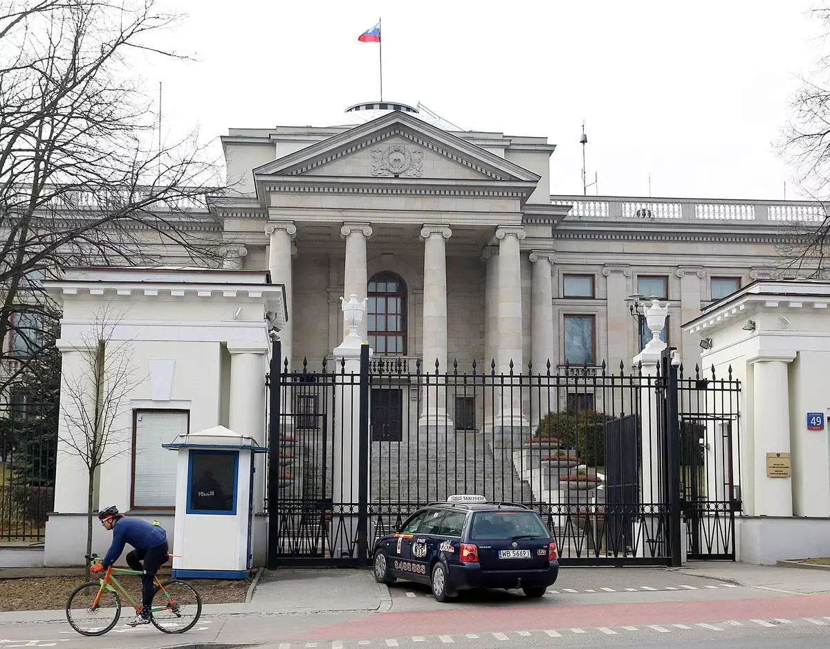 FILE - A taxi in front of the Russian Embassy in Warsaw, Poland, Monday, March 26, 2018. (AP Photo/Czarek Sokolowski, File)