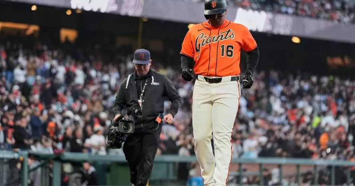 Rafael Devers goes deep and Robbie Ray pitches the Giants to a 5-2 win over the Pirates