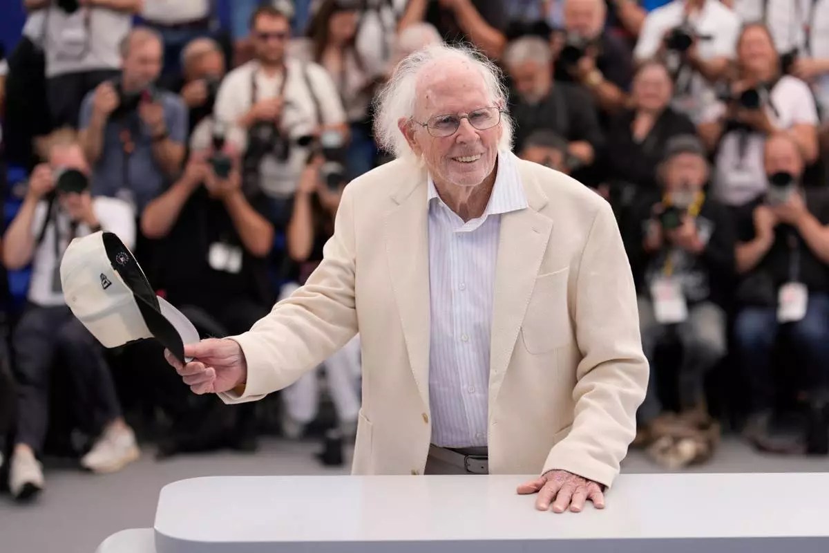 Bruce Dern poses for photographers at the photo call for the film 'Dernsie: The Amazing Life of Bruce Dern' at the 79th international film festival, Cannes, southern France, Wednesday, May 20, 2026. (AP Photo/John Locher)