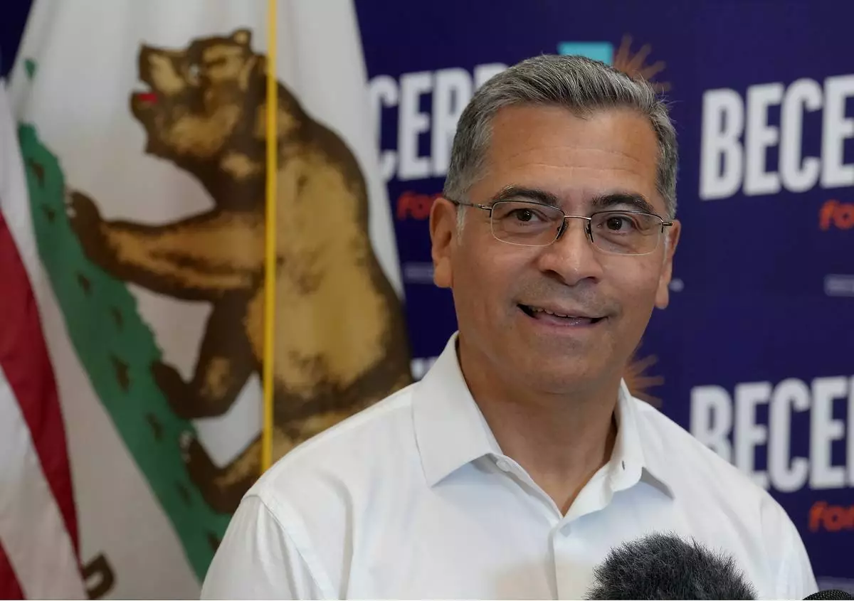 California gubernatorial candidate,Xavier Becerra, D-CA talks with reporters after appearing at a town hall meeting in Sacramento, Calif., Monday, May 11, 2026. (AP Photo/Rich Pedroncelli)