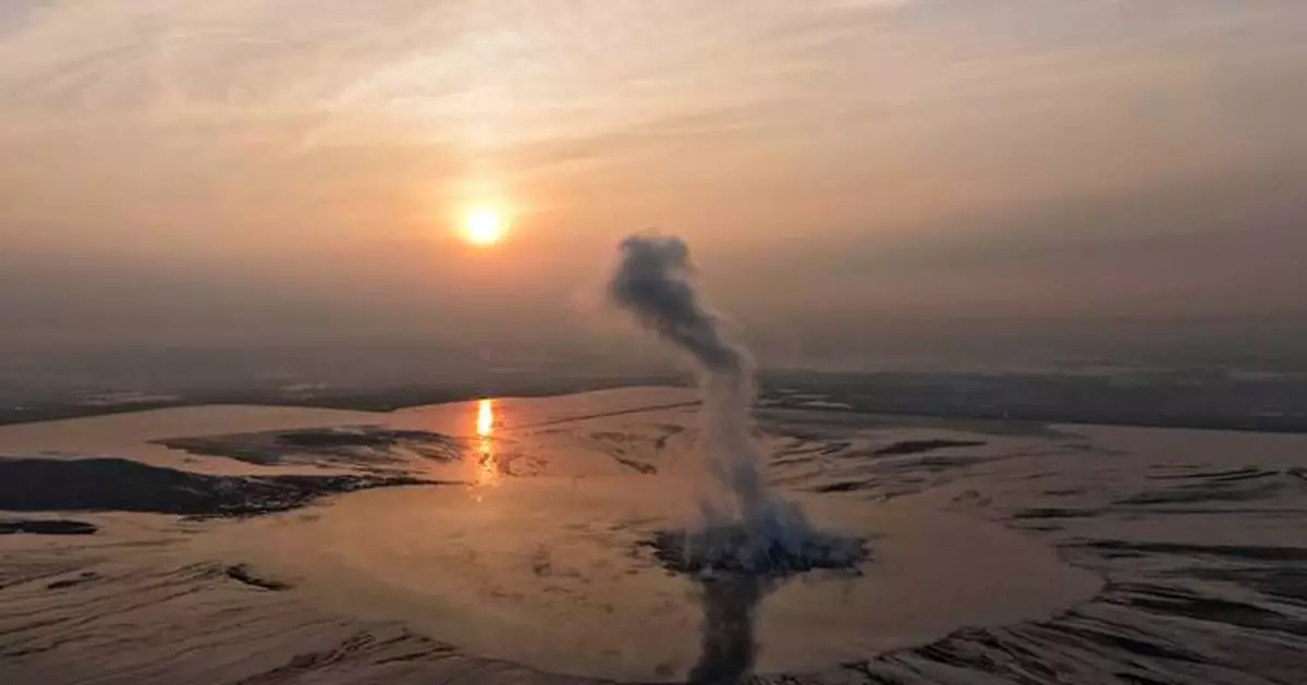 Indonesians mark 20 years since mud volcano eruption swallowed up entire communities in East Java