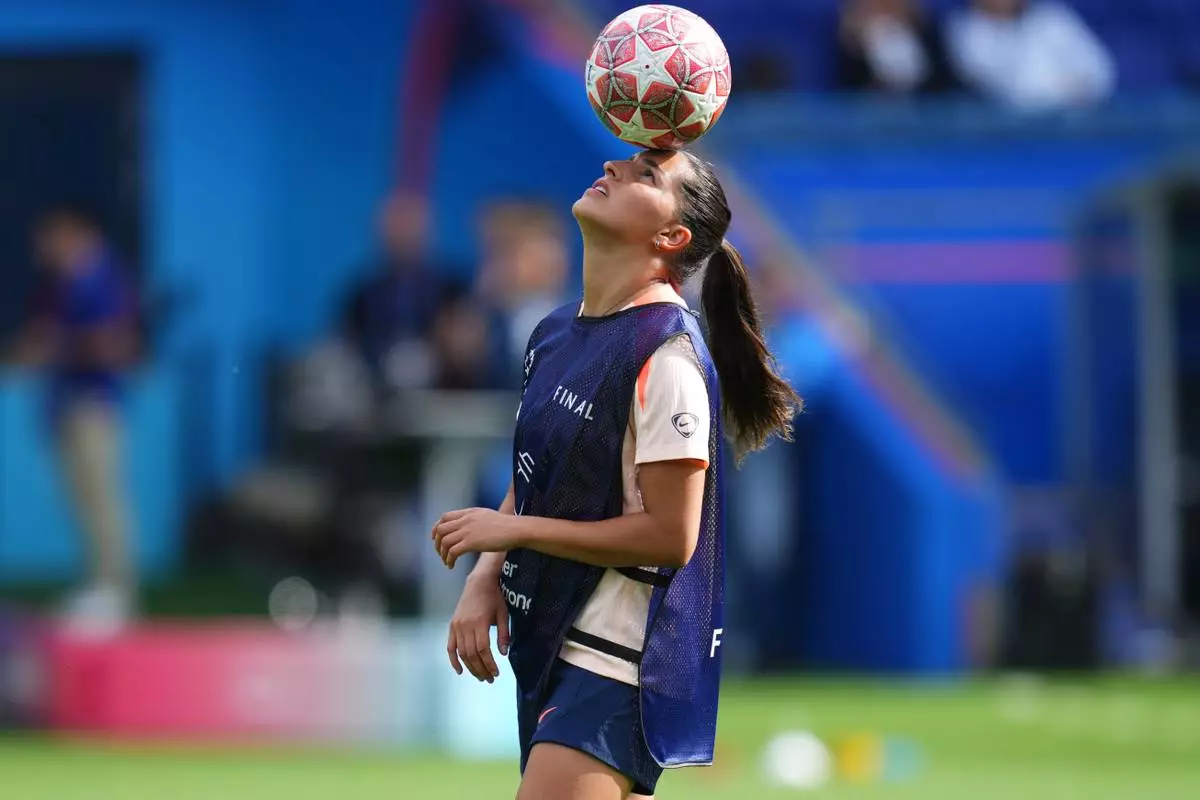 Barcelona's Kika Nazareth plays with a ball during a training session on the eve of the Women's Champions League final soccer match between FC Barcelona and OL Lyonnes, in Oslo, Friday, May 22, 2026. (AP Photo/Kirsty Wigglesworth)