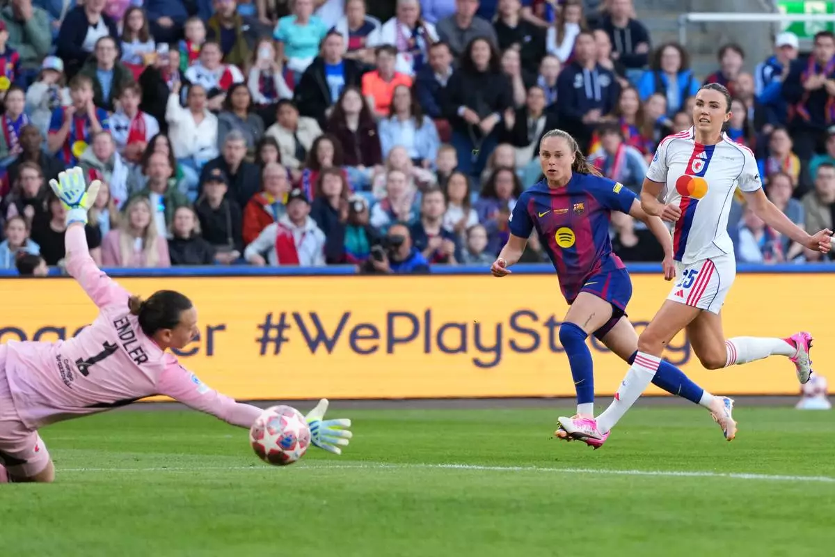 Barcelona's Ewa Pajor, center, scores the opening goal during the Women's Champions League final soccer match between FC Barcelona and OL Lyonnes, in Oslo, Saturday, May 23, 2026. (AP Photo/Kirsty Wigglesworth)