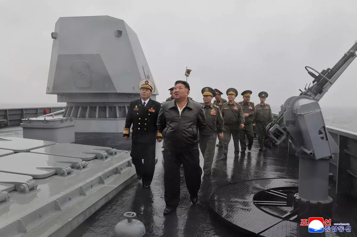 In this photo provided on May 8, 2026, by the North Korean government, its leader Kim Jong Un, center, visits the destroyer Choe Hyon to review its maneuverability off North Korea's west coast, Thursday, May 7, 2026. Independent journalists were not given access to cover the event depicted in this image distributed by the North Korean government. The content of this image is as provided and cannot be independently verified. Korean language watermark on image as provided by source reads: "KCNA" which is the abbreviation for Korean Central News Agency. (Korean Central News Agency/Korea News Service via AP)