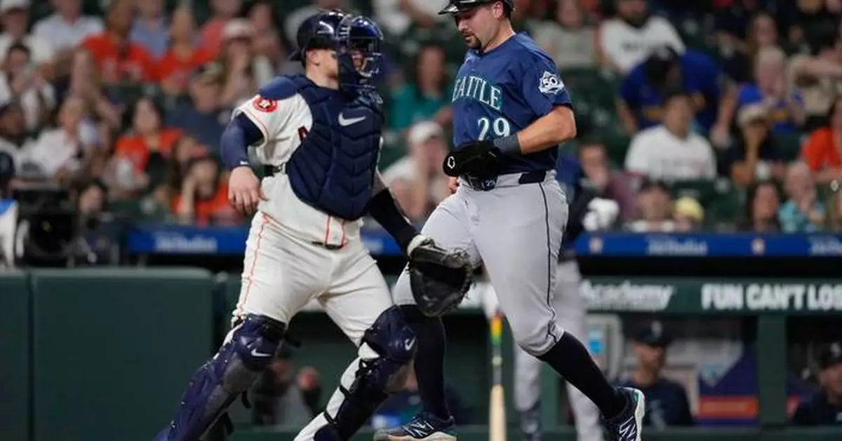 Cal Raleigh tried a full-uniform shower. The next night, his bat finally woke up