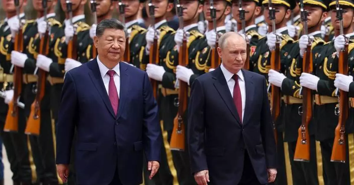 Xi and Putin highlight their friendship and cooperation on energy and other issues in Beijing visit