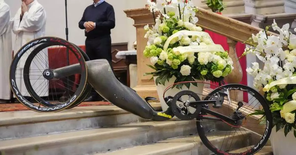 Thousands at funeral for Italian auto champ and Paralympic gold medalist Alex Zanardi