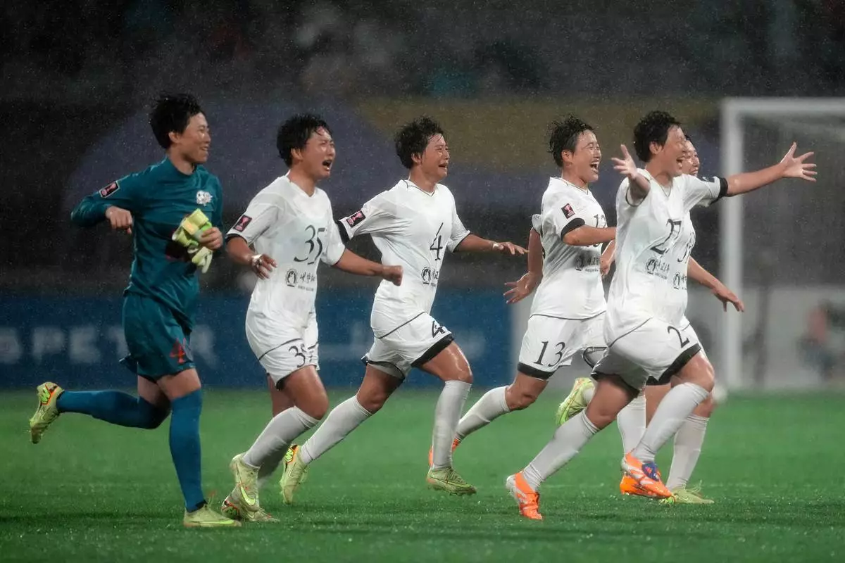 North Korea's Naegohyang Women's FC players celebrate after defeating South Korea's Suwon FC in their AFC Women's Champions League semifinal match in Suwon, South Korea, Wednesday, May 20, 2026. (AP Photo/Lee Jin-man)