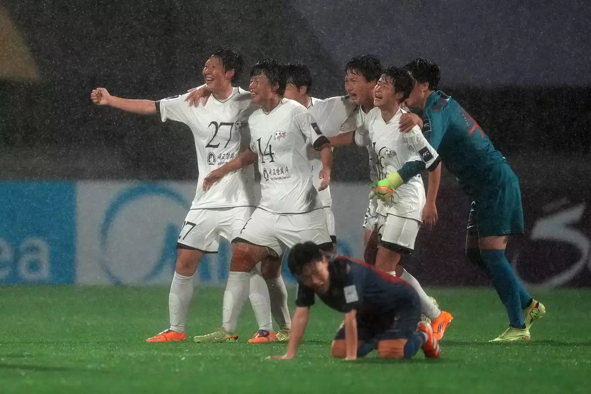 North Korea's Naegohyang Women's FC players celebrate after defeating South Korea's Suwon FC in their AFC Women's Champions League semifinal match in Suwon, South Korea, Wednesday, May 20, 2026. (AP Photo/Lee Jin-man)