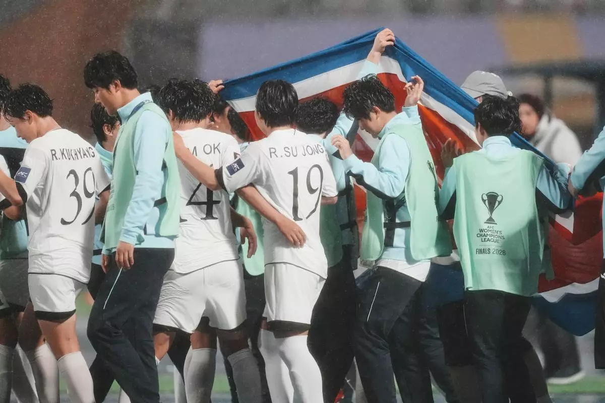 North Korea's Naegohyang Women's FC players celebrate after defeating South Korea's Suwon FC in their AFC Women's Champions League semifinal match in Suwon, South Korea, Wednesday, May 20, 2026. (AP Photo/Lee Jin-man)