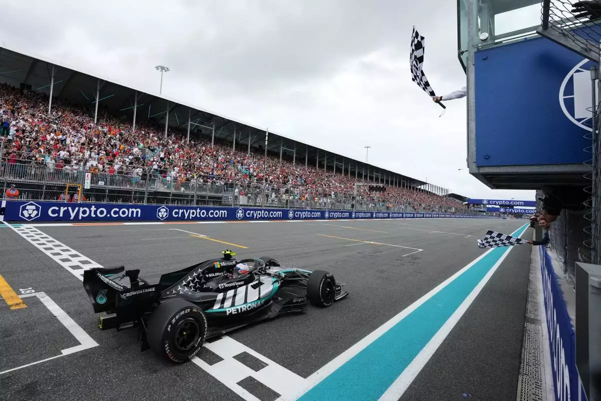 Mercedes driver Kimi Antonelli of Italy finishes first in the Miami Formula One Grand Prix auto race, Sunday, May 3, 2026, in Miami Gardens, Fla. (AP Photo/Rebecca Blackwell, Pool)
