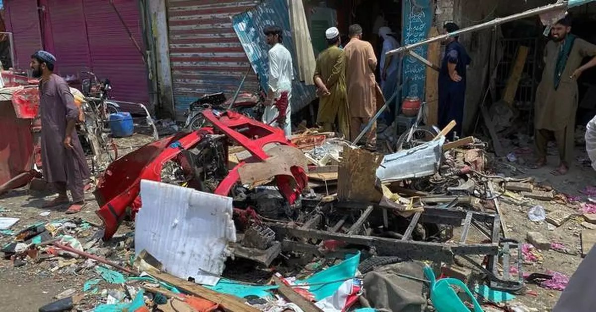 Bomb rigged to rickshaw explodes in Pakistan bazaar, killing 9 and wounding more than 2 dozen others
