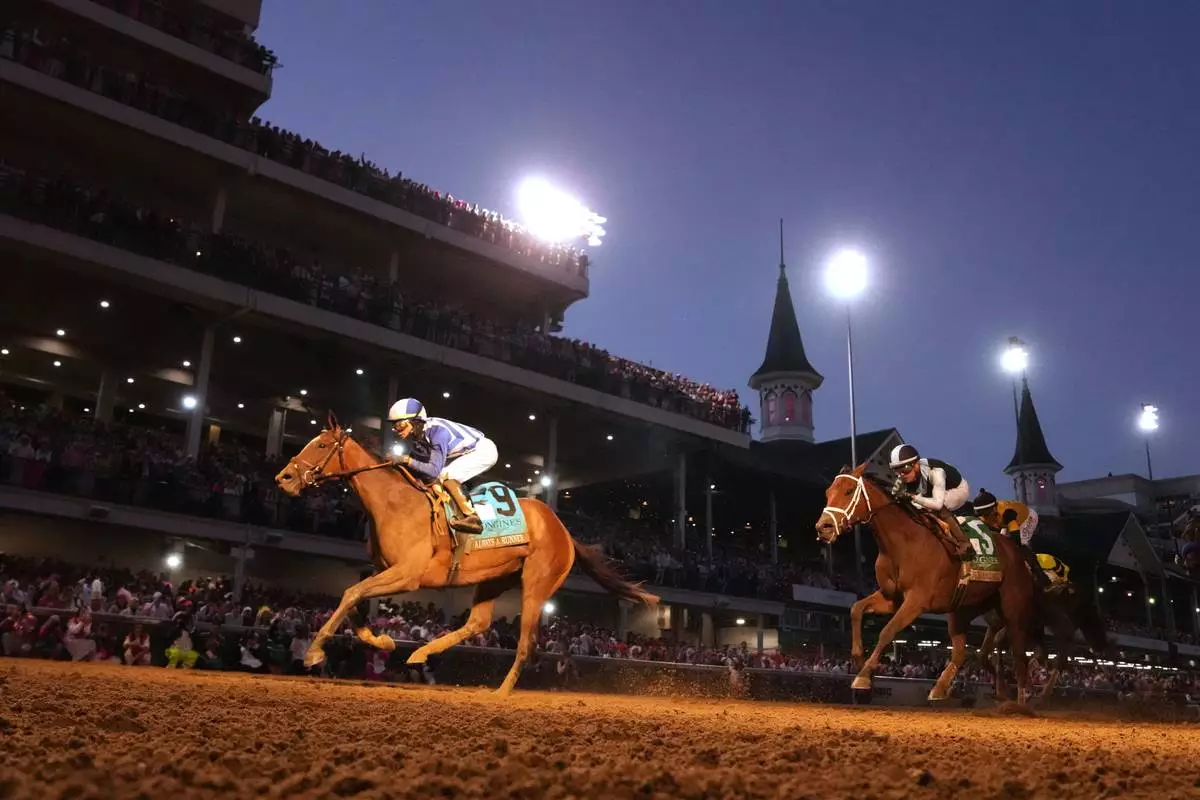 Always a Runner (9) ridden by Jose L. Ortiz wins the 152nd running of the Kentucky Oaks horse race at Churchill Downs, Friday, May 1, 2026, in Louisville, Ky. (AP Photo/Abbie Parr)