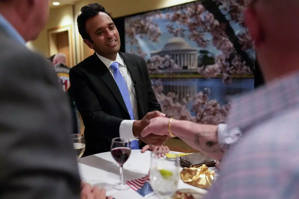 Republican Ohio gubernatorial candidate Vivek Ramaswamy greets supporters before the Warren County Republicans Lincoln Day Dinner at the Great Wolf Lodge in Mason, Ohio, Friday, April 10, 2026. (AP Photo/Carolyn Kaster)