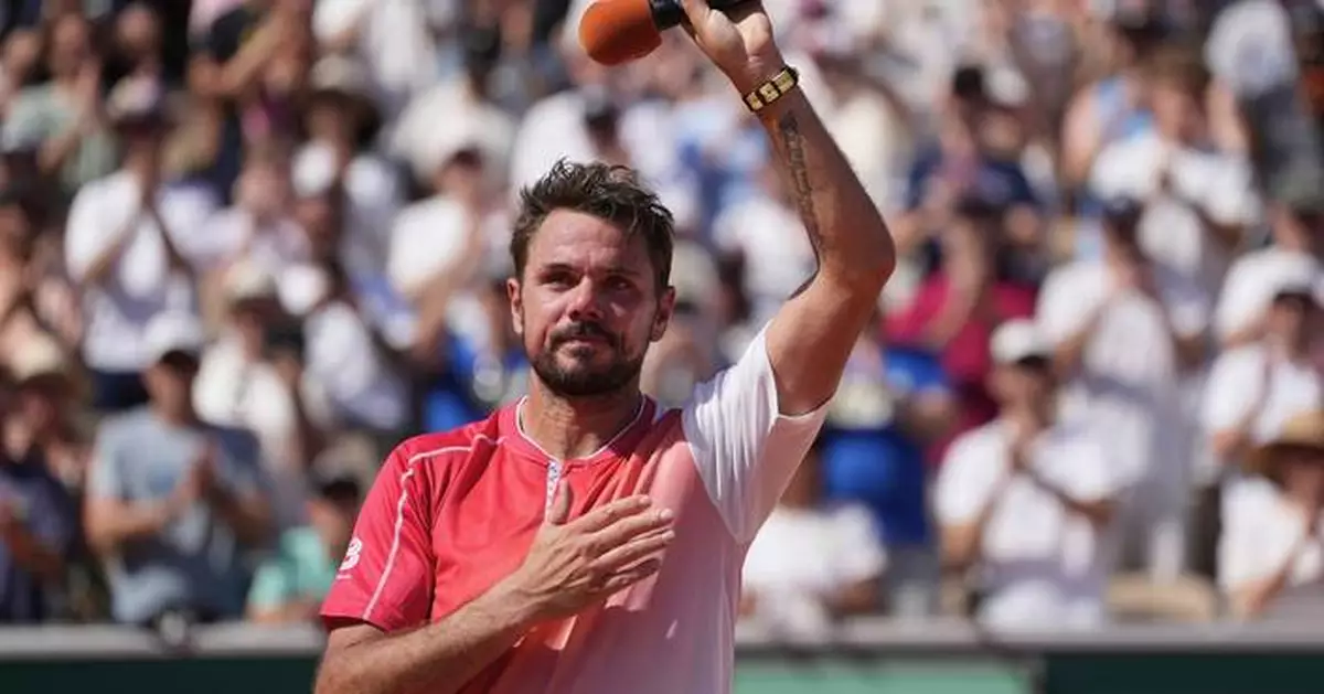 Wawrinka waves emotional goodbye to French Open after losing in first round