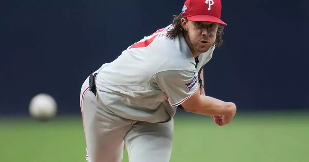 Phillies place starting pitcher Aaron Nola on the paternity list, recall Nolan Hoffman