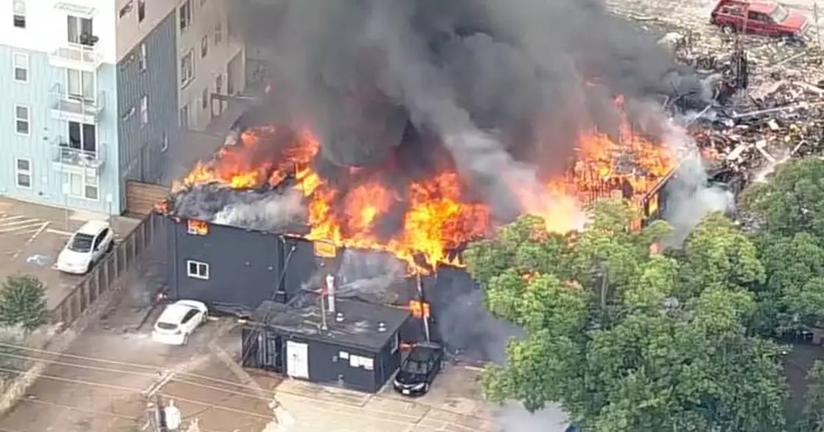 Crews in Dallas search for missing after some killed in massive apartment fire, officials say
