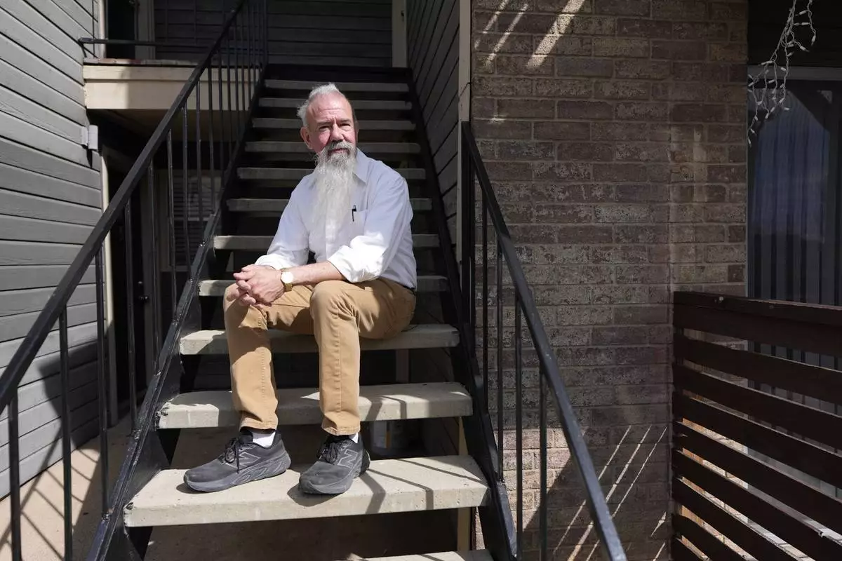 Matthew Haines, owner of the Oakwood Apartments, poses for a photo at the comminty housing location in Arlington, Texas, Tuesday, March 17, 2026. (AP Photo/Tony Gutierrez)