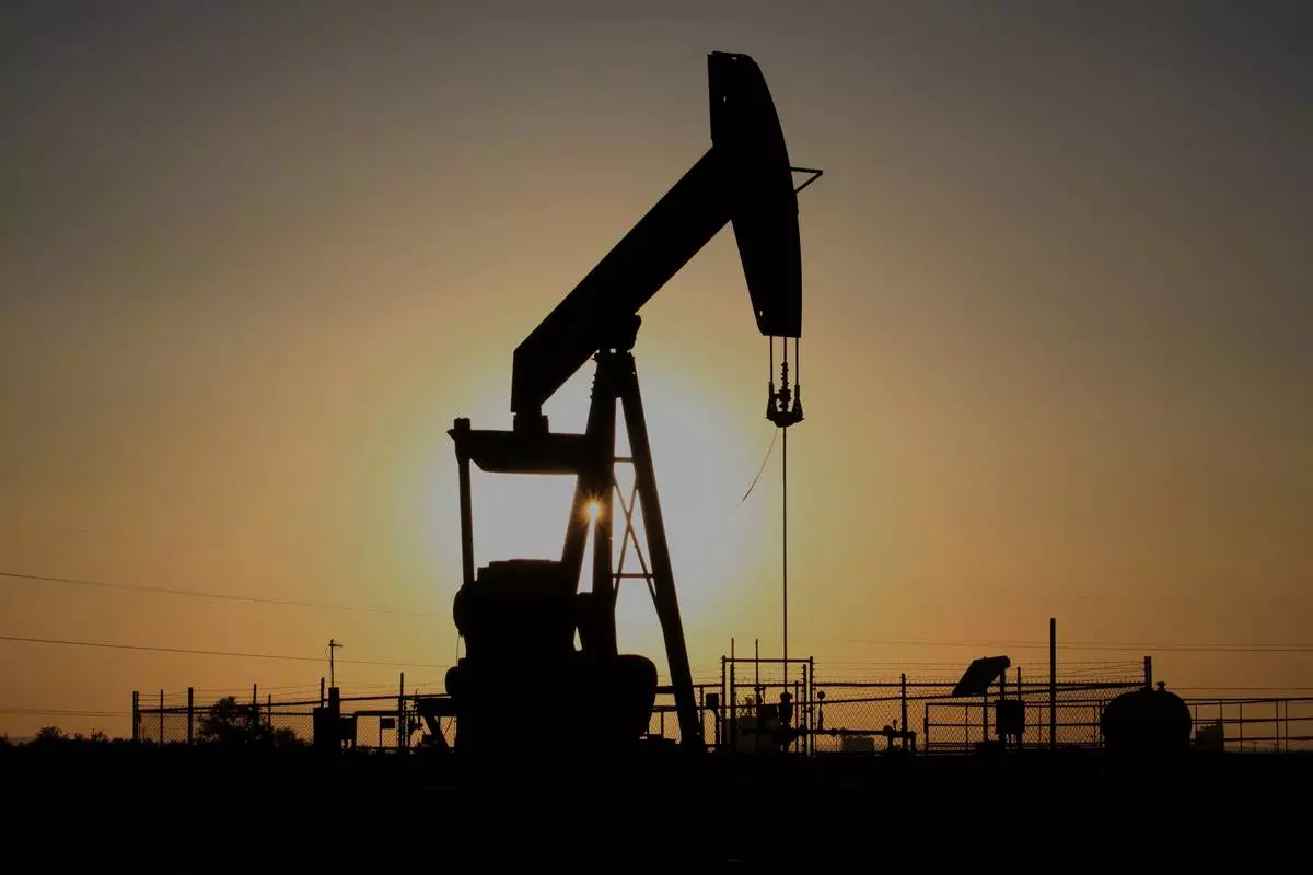 FILE - A pump jack operates at sunset in the Permian Basin near Loving, N.M., on Tuesday, May 20, 2025. (AP Photo/Susan Montoya Bryan, file)
