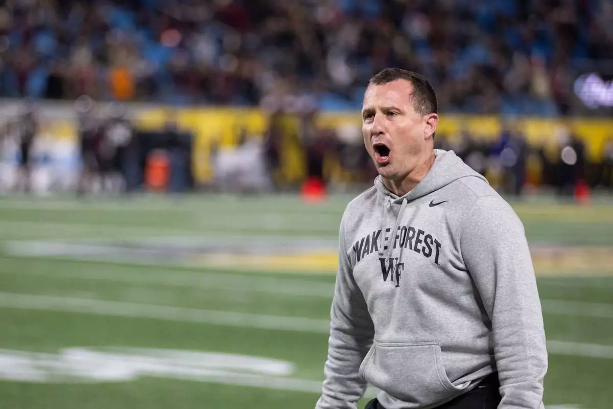FILE - Wake Forest head coach Jake Dickert argues for a penalty during the second half of the Duke's Mayo Bowl NCAA college football game against Mississippi State, Jan. 2, 2026, in Charlotte, N.C. (AP Photo/Scott Kinser, File)