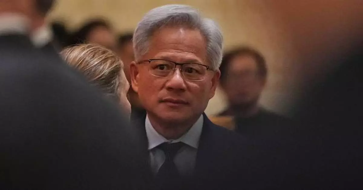 Nvidia CEO Jensen Huang tries Beijing's 'zhajiangmian' on food tour
