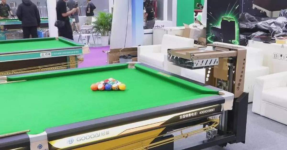 Smart billiard table capable of assembling balls in 18 seconds showcased at exhibition