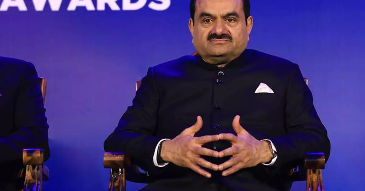 US agrees to settle lawsuit that accused an Indian billionaire of hiding an alleged bribery scheme