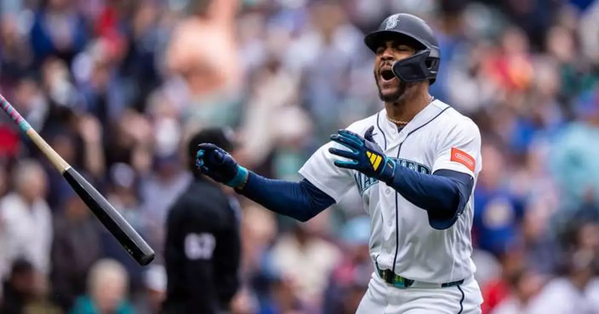 Woo strikes out 9 in 6 scoreless innings as Mariners beat Braves 3-1