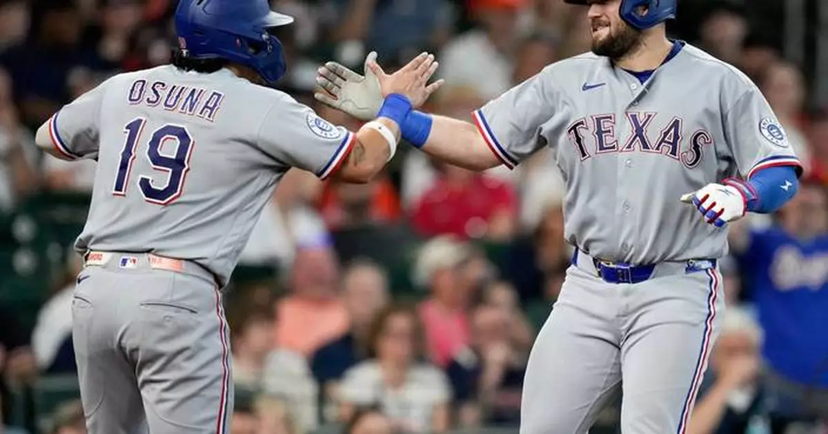 Burger blasts a homer, drives in 4 as Eovaldi powers the Rangers past the Astros 8-0