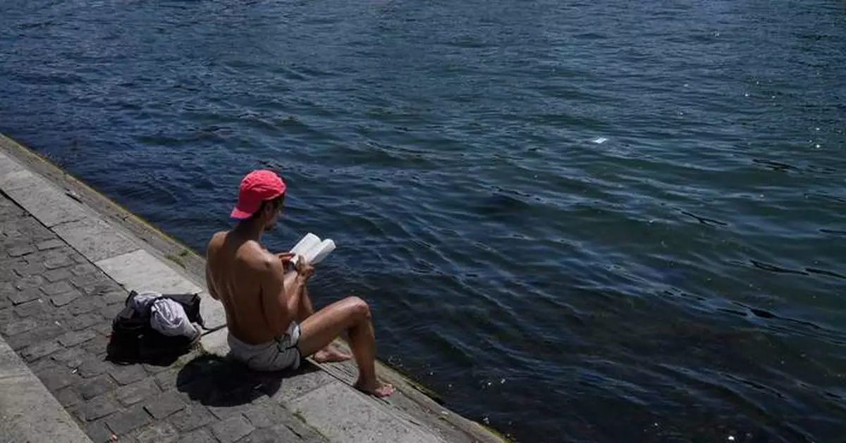 Parts of Europe swelter in record May heat as deaths at amateur sports events spur warnings
