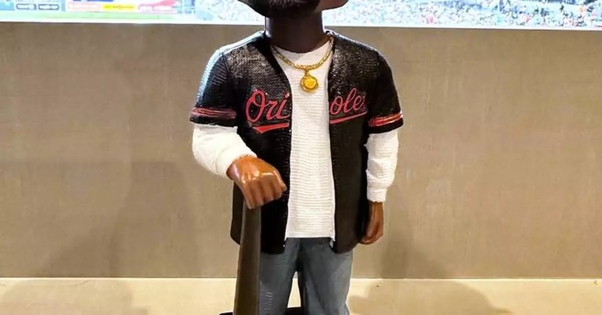 Orioles hold Tupac Skakur bobblehead promotion, and his sister throws out the ceremonial first pitch