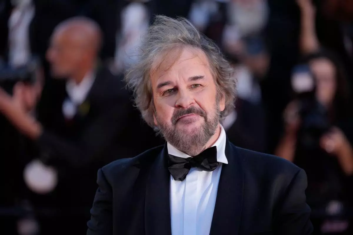Peter Jackson poses for photographers at the opening ceremony and premiere of the film 'The Electric Kiss' during 79th international film festival, Cannes, southern France, Tuesday, May 12, 2026. (AP Photo/John Locher)