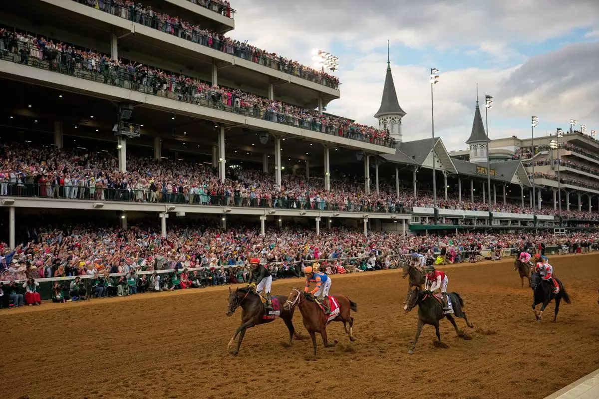 Golden Tempo, left, ridden by Jose L. Ortiz wins the 152nd running of the Kentucky Derby horse race at Churchill Downs, Saturday, May 2, 2026, in Louisville, Ky. (AP Photo/Abbie Parr)